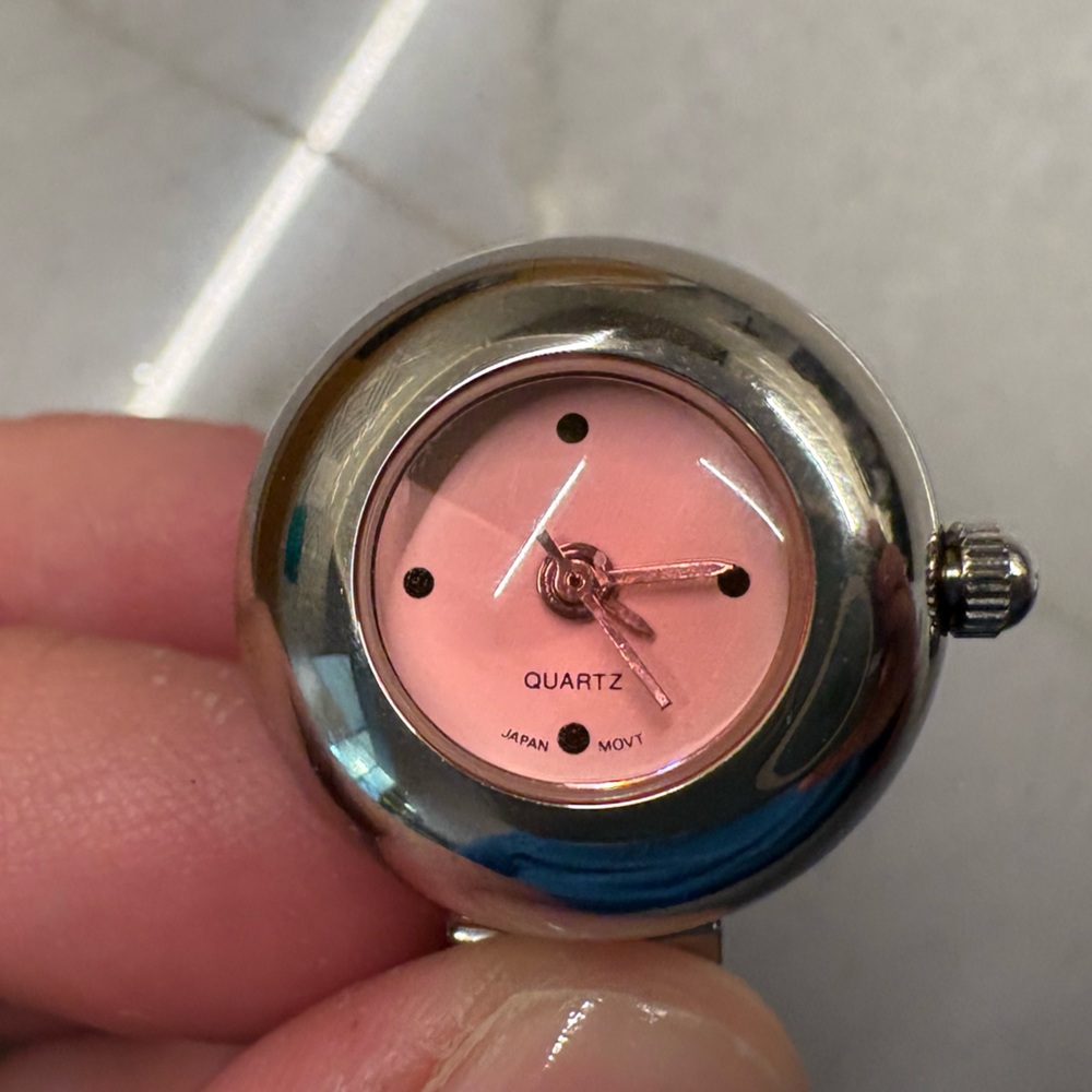 Watch ring with pink background